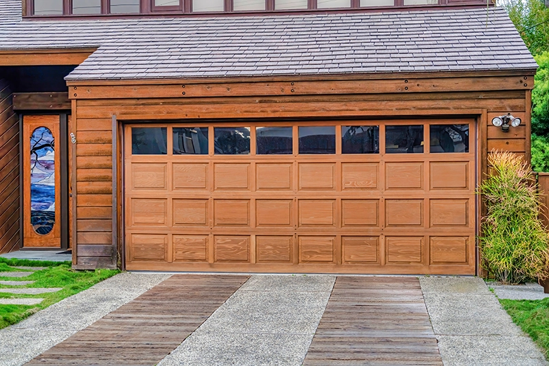 America's Garage Doors - How to Keep Your Garage Door On Track and Running Smoothly